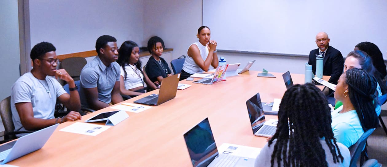 Professor Larry Jackson leads a First-Year Seminar class "Black Baltimore Archives - From Frederick Douglass to Billie Holiday."