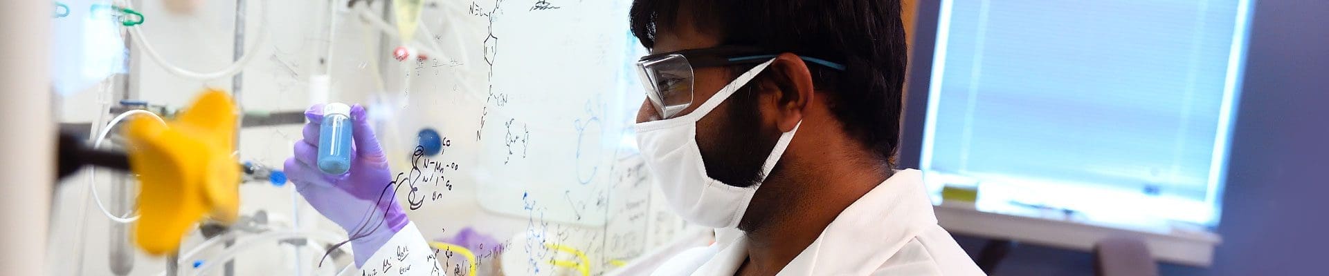 Graduate assistant in the Chemistry department prepare the Sara Thoi lab