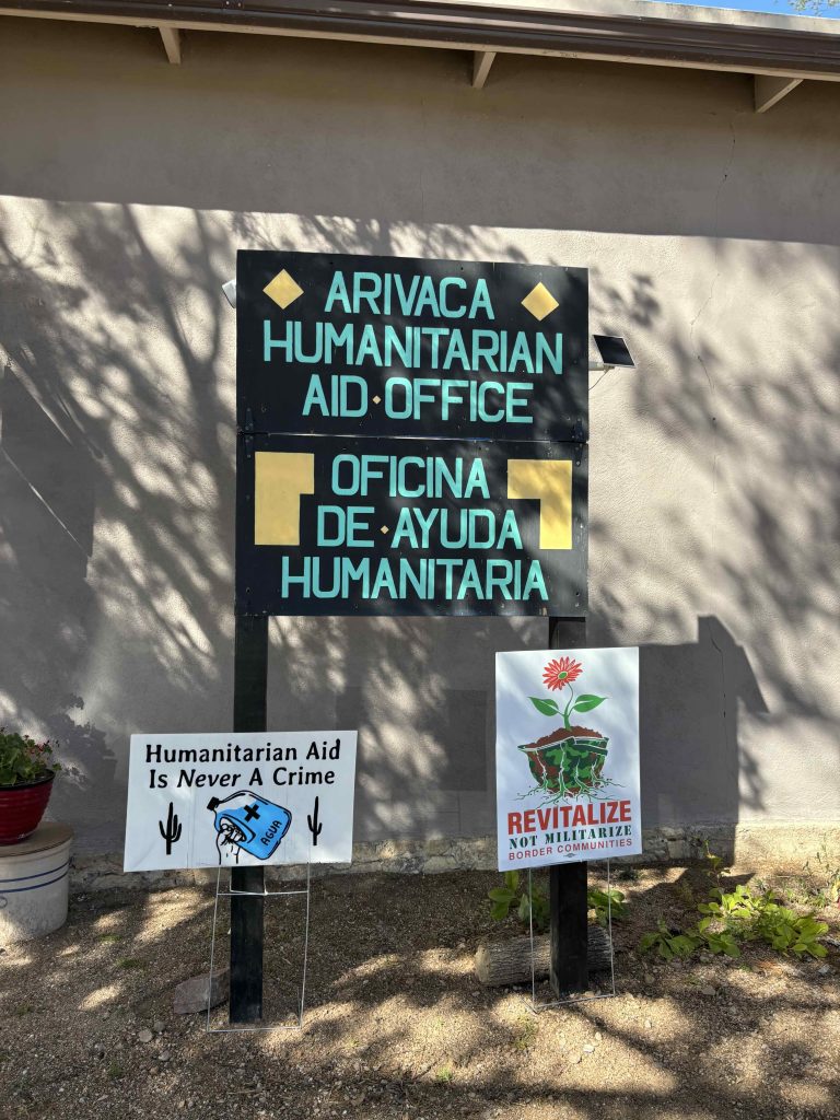 Sign that reads Arivaca Humanitarian Aid Office in English and Spanish