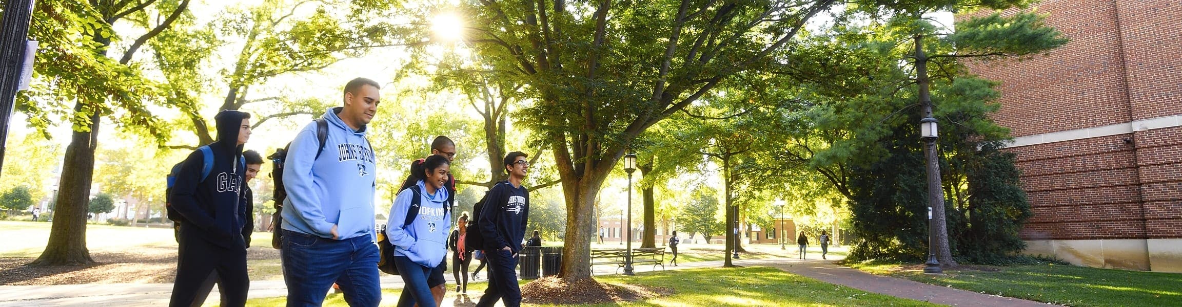 group of students walking on campus