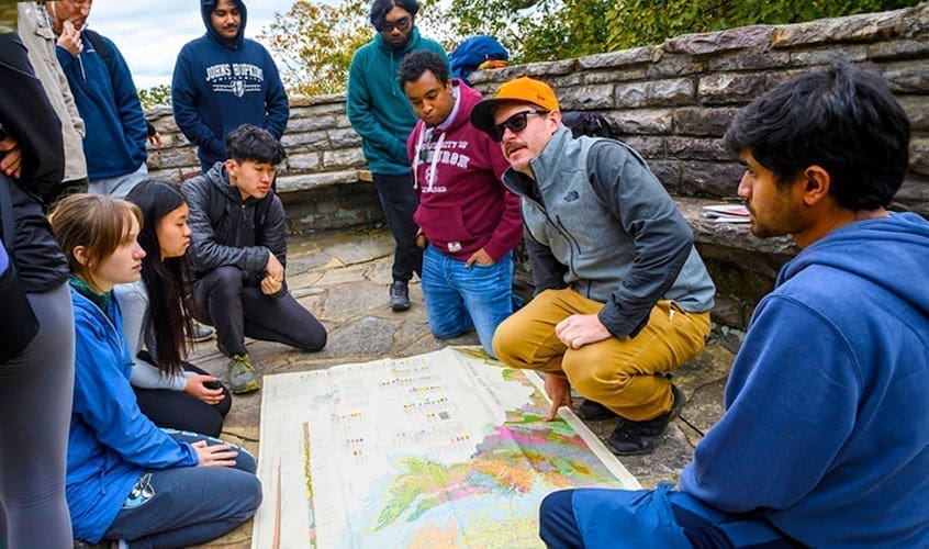 Earth and Planetary Sciences assistant professor Daniel Viete led students on a field trip to explore Gambrill State Park in Fall 2022 as a component of his course, “Dynamic Earth: An Introduction to Geology.”
