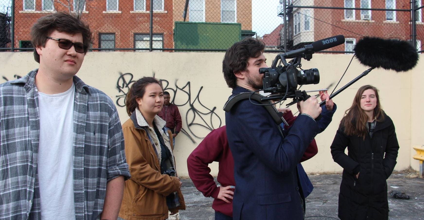 Student filmmakers in the field.
