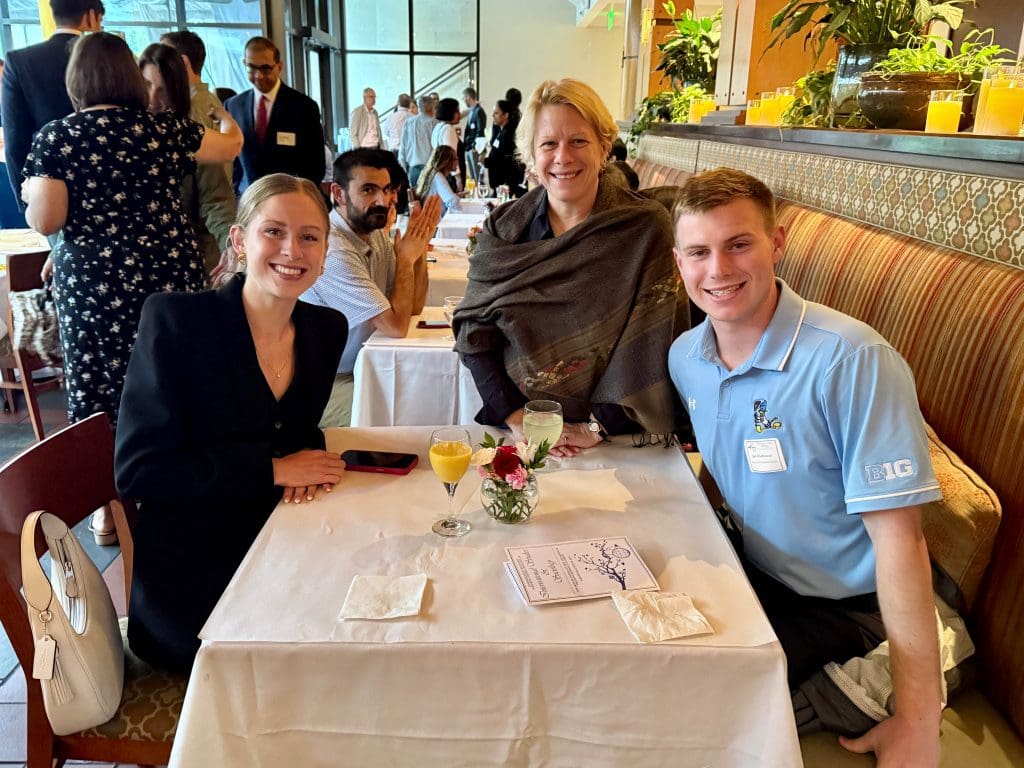 Giovanna Dore, Jack Charboneau, and family friend