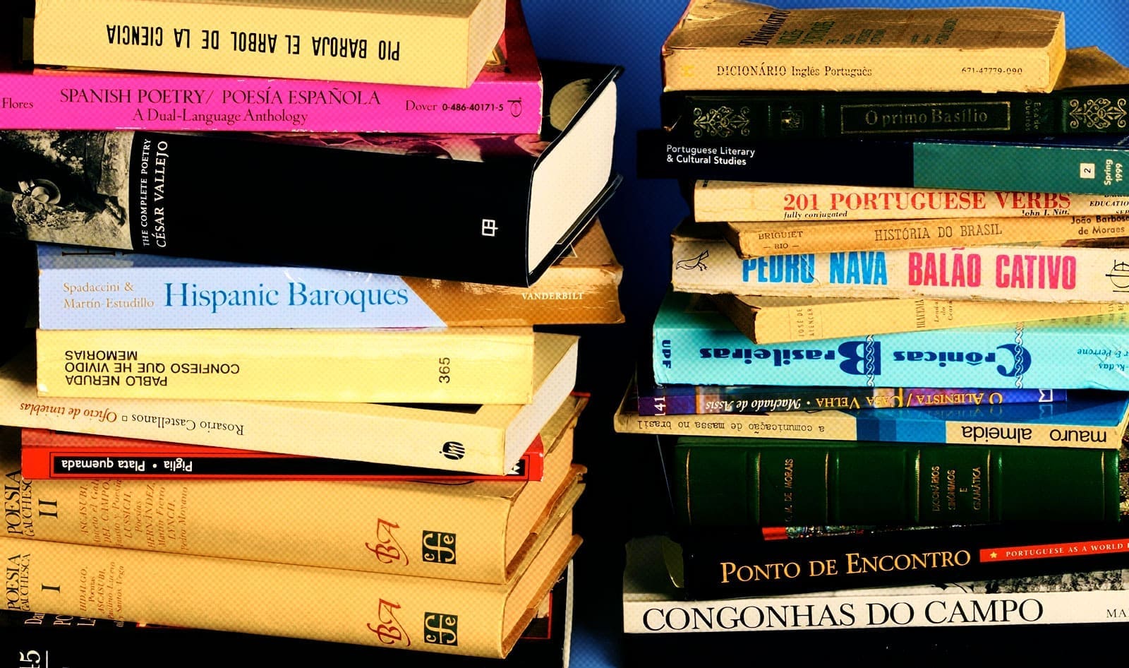 stacks of books in spanish and portuguese