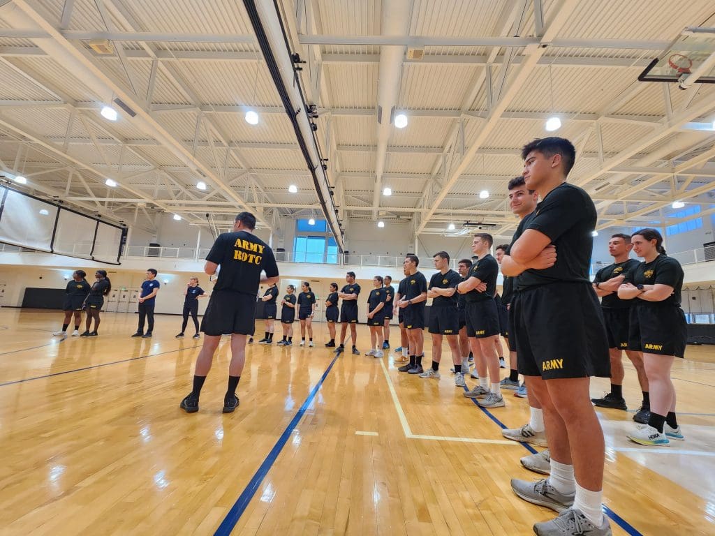 cadets standing in line in the gym