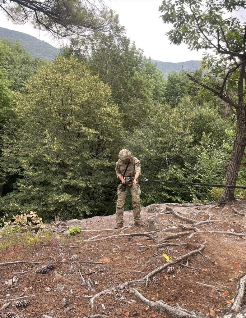 Cadet Thompson rappels off mountain
