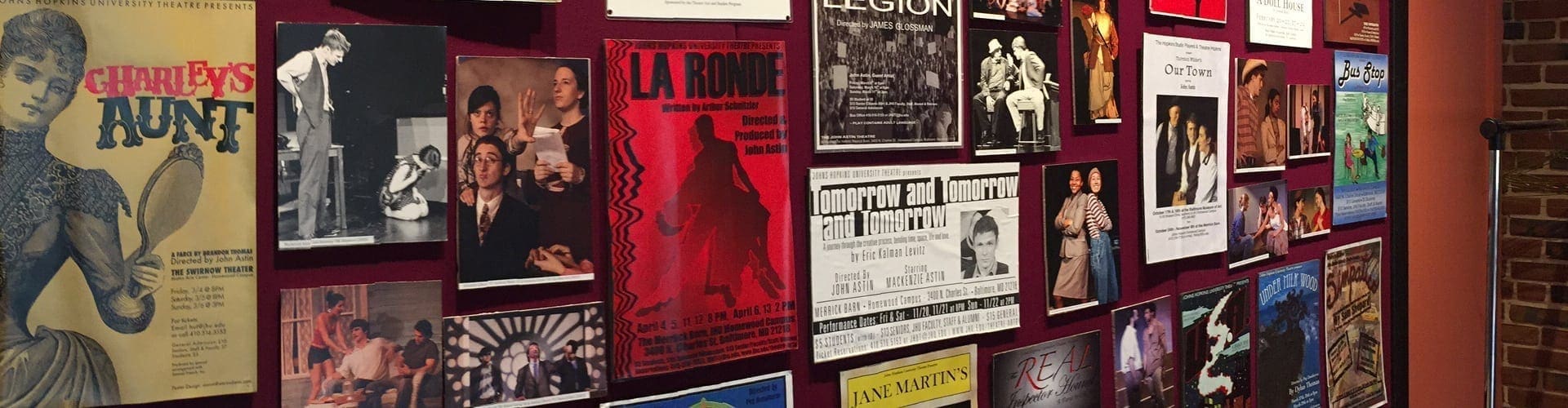 Wall of posters showing all theatre productions