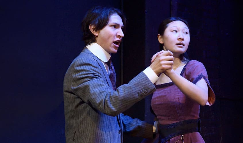 two students performing in the play "Cherry Orchard"