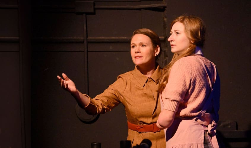 two students perform in the play "The Glass Menagerie"