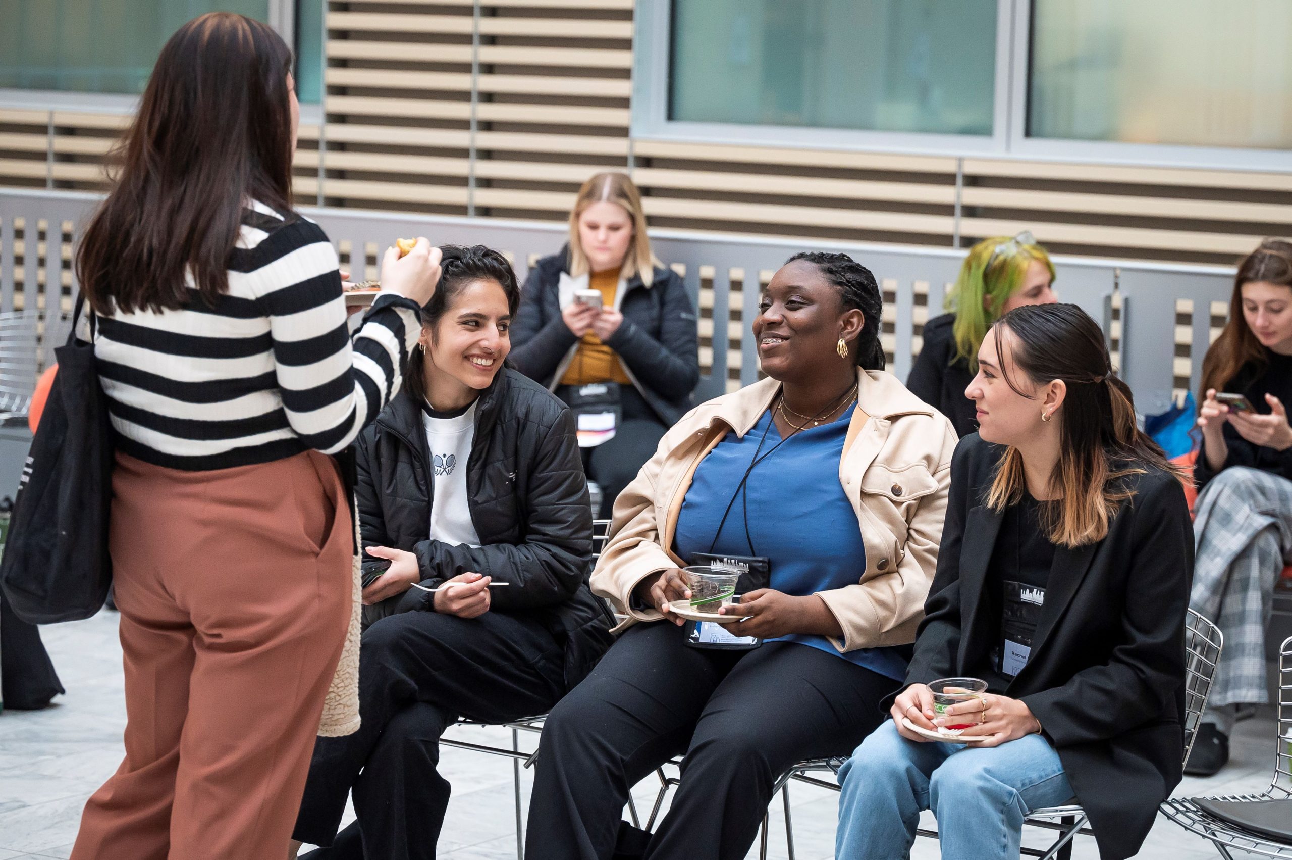 Macksey Symposium participants chatting