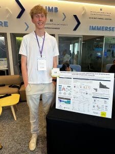 Will Bowers with his research poster