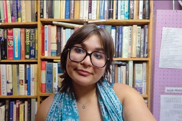Sharma in a library