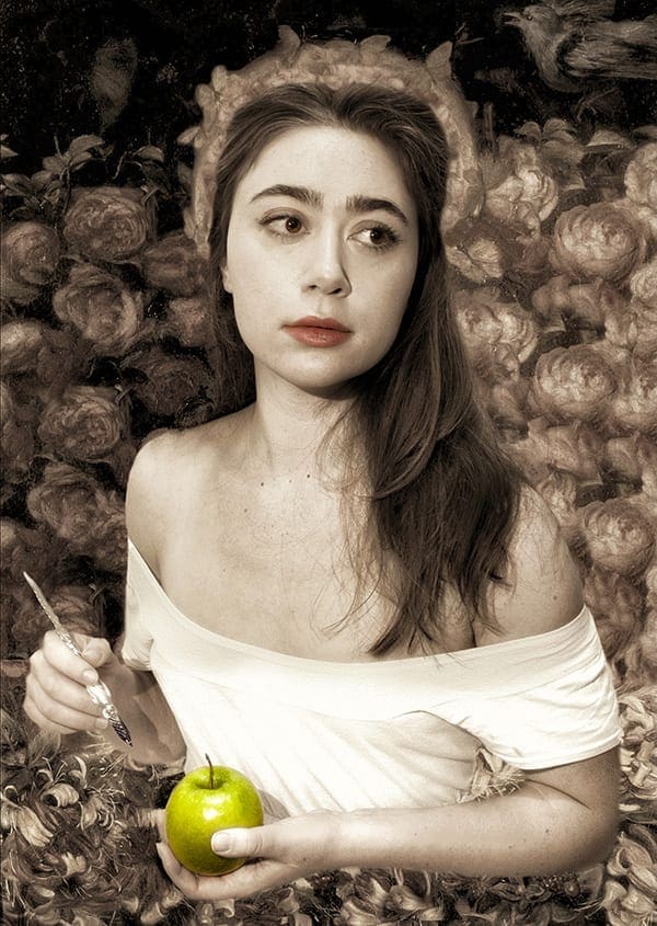 photo of woman in white with green apple