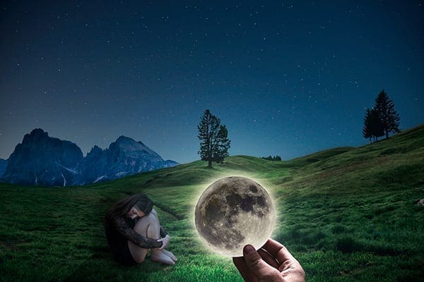 photo collage of woman in field and a hand holding a small moon