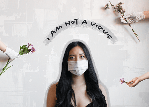 photo of woman with mask and flowers. text says "I am not a virus"