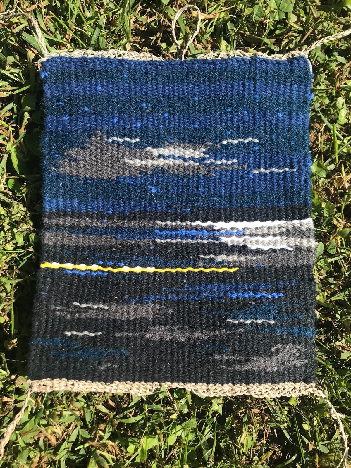 woven blue and black rectangle