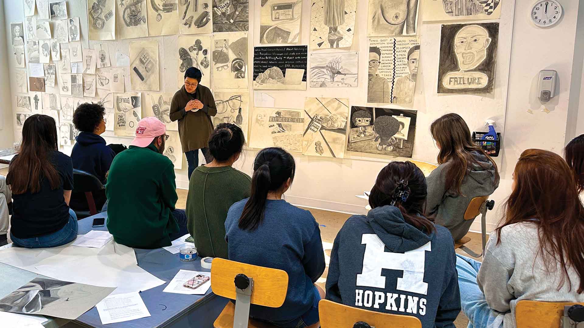 image of students sitting in a drawing classroom