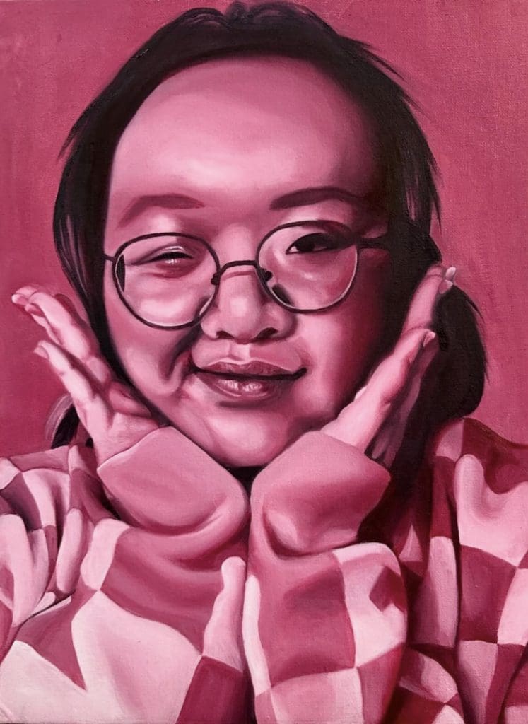 Student self portrait in pink tones