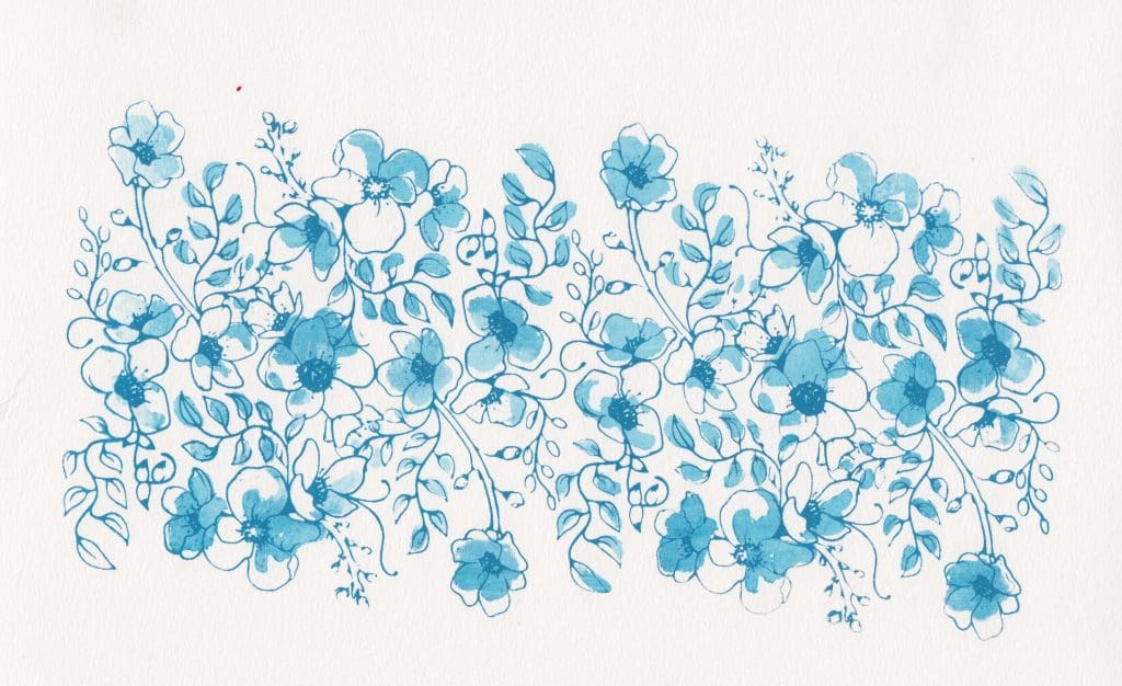 a screen printed pattern of blue flowers