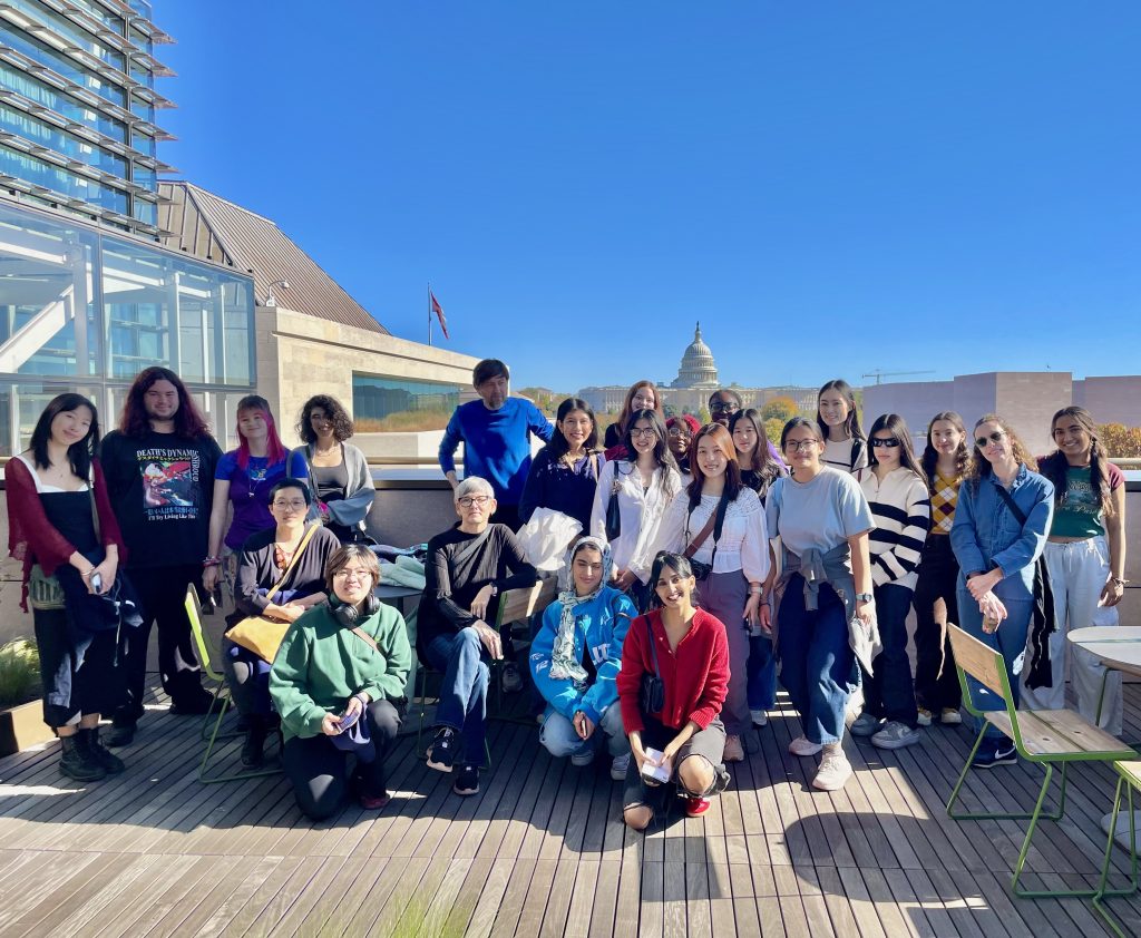 Students and faculty from the CVA standing on the roof deck at 5t5 penn in D.C.