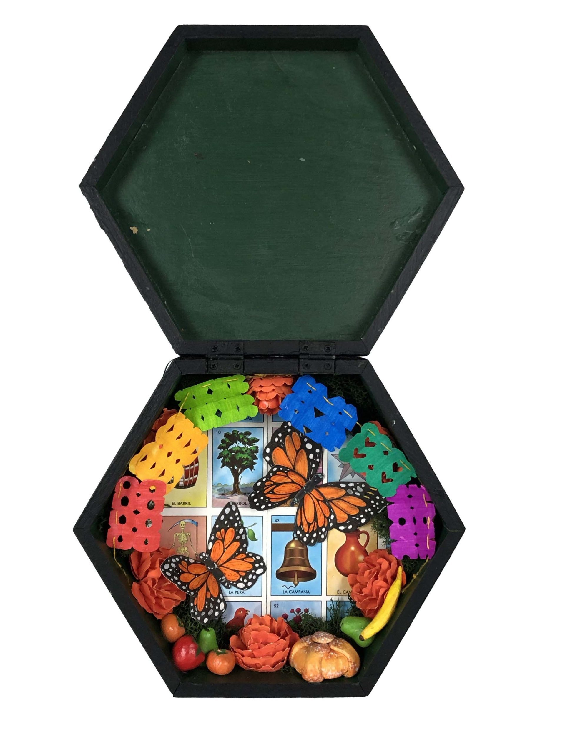 black hexagon box with monarch butterflies