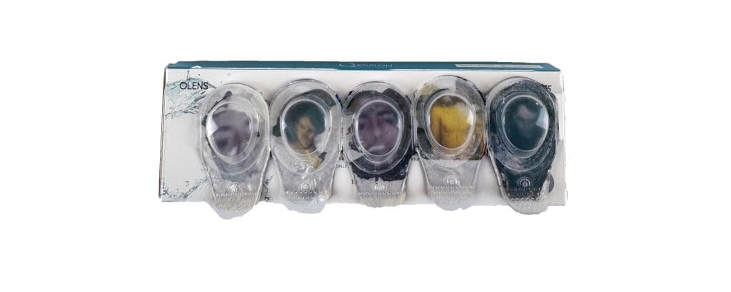 Photographs of peoples faces printed inside contact lens boxes
