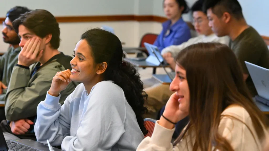 students listen intently during class